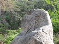 頭なき石仏坐像
